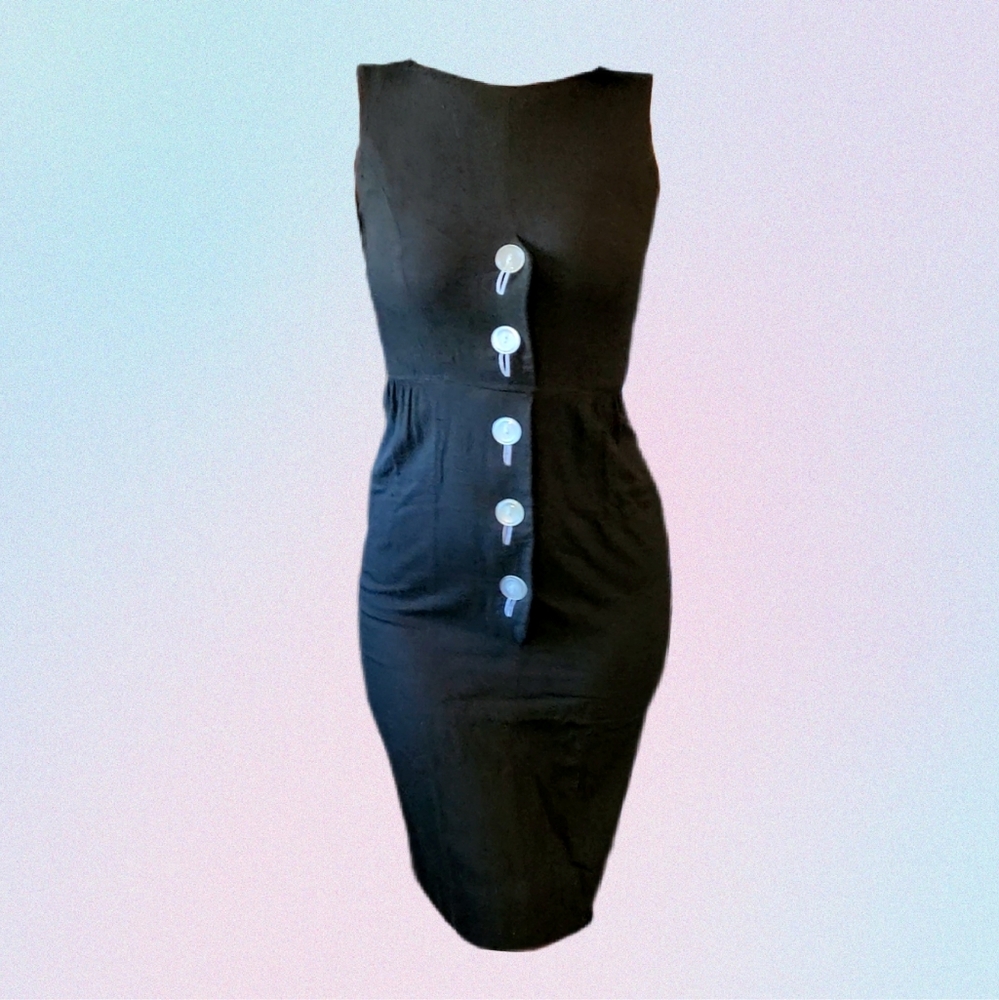 Vintage 1950s black dress with white pearlescent buttons